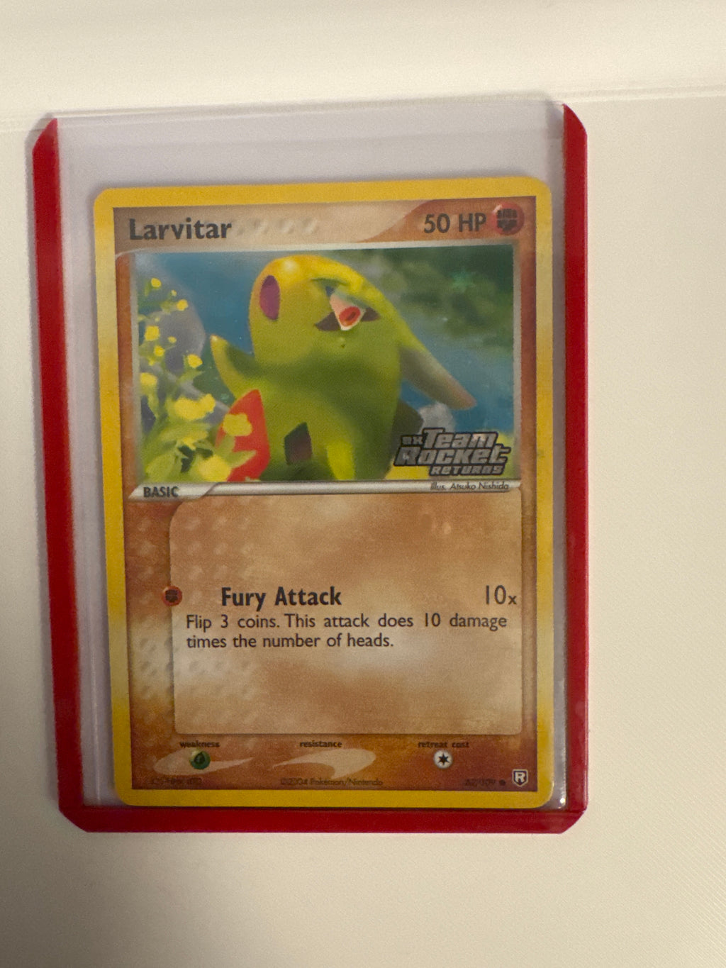Larvitar 62/109 reverse holo stamped ex rocket returns
